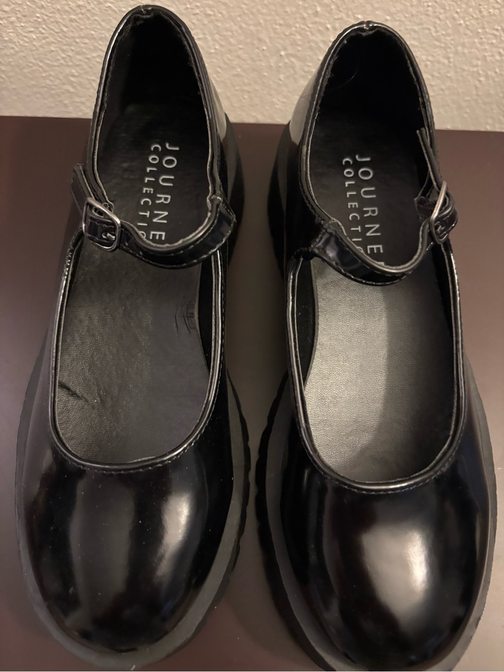 Journee Collection Kamie Women’s Black Patent Mary Janes with Buckle.
Size 6